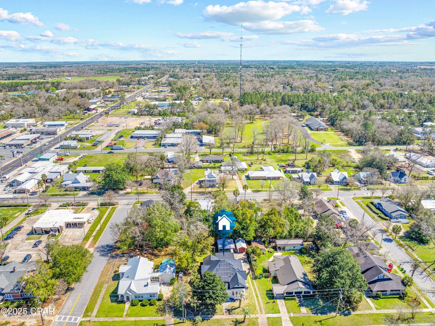 100% financeable------PRICED BELOW MARKET FOR QUICK SALE!!!! Newly Painted inside and outside. Don't miss this charming home in Chipley, FL with custom woodwork around the wrap around porch.  4 Car Carport in back. Cosmetic touches needed by its new owner to complete. Historical home built in 1904 with approx. 3343 SF of living space with 3 bedrooms downstairs. Original Master on first floor with additional sitting room. 1 New Master/Large Bedroom upstairs with bathroom. PRIOR updates: Roof and AC 2019, 2020 Gas Tankless Water Heater, 2nd AC unit 2004. Plumbing updated within the last 2 years. Wiring updated but still some work may be needed. Fireplaces have been sealed but Frames still in place for other options. Solar Panels - Paid in full. Bay Windows on bottom floors, Windows have been fixed to work, some may need further repair. Hardwood flooring, Vinyl & Laminate,. Baths have Tile floors. Kitchen has minimal appliances (Refrig., Gas Stove, Dishwasher), unknown condition. New Water Softener, will remain, unconnected. Has Water/Sewer connections. Come get your chance to make this your dream home with a little work. Call for your appointment today!