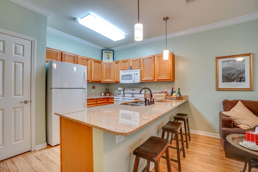 MOVE IN READY!! Beautiful 2 bedroom 2.5 bath townhome in Quail Hollow has been well kept and Very Clean! Beautiful wood laminate flooring down stairs w/ 1/2 bath granite counters in kitchen, new garbage disposal, refrigerator 2 years old, like new carpet upstairs with bonus room can be used for an office. Both bedrooms upstairs have full bathrooms very spacious lots of storage french doors leading out to patio. Community offers pool and gym area. Call your Realtor today and schedule a showing.