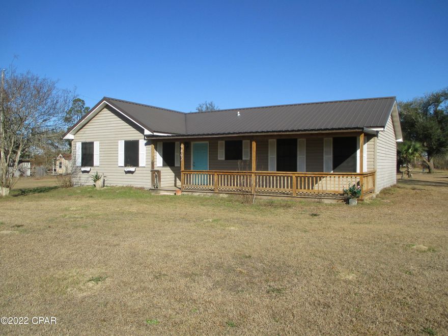 CURRENTLY UNDER CONTRACT, SELLER ACCEPTING BACK-UP OFFERS... NICE HOME IN THE COUNTRY - This very well maintained 2-bedroom, 2 bath home sits on 1.7 acres, has a new metal roof, cathedral ceilings and a very large great room.  The exterior includes a covered front porch, an enclosed rear porch and plenty of wide-open space.  The single access road helps to keep traffic and noise at a minimum so if a little peace and quiet is on your list of home requirements, schedule a visit to this one.   Measurements are approximate.