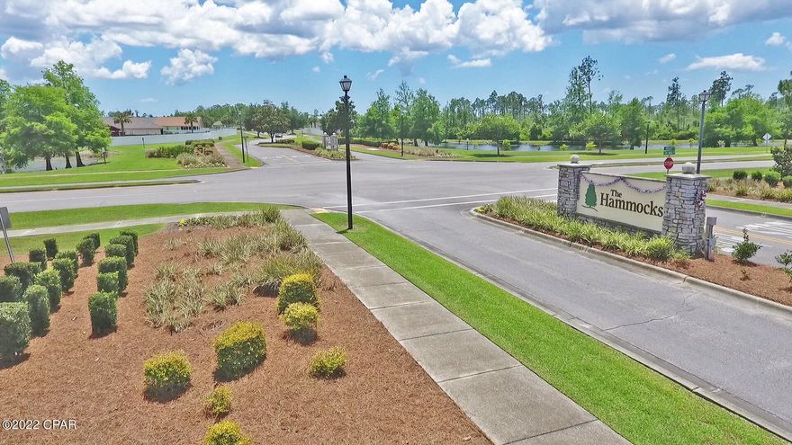 Nestled in the beautiful Hammocks neighborhood. 2 bedroom 2 bath with a 1 car garage. Kitchen has beautiful granite countertops, white cabinets, LVP flooring, and more. End unit making this one of the most desirable units available in the Hammocks with lots of natural light. Communities landscape is beautifully kept up by the HOA, and has a large community pool. Sqft is estimated please measure if important. Buyer to pay 0.5% St Joe transaction fee.