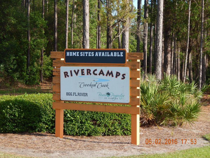 This is your own piece of paradise. Large lot in a gated community with enough natural beauty landscape to keep wildlife happy, but there is also Plenty of amenities for you too, which includes a huge recreational building that has a gym, pool, lounge areas,tables,and more. Community boat ramp with docks, a pier that stretches out into the bay, Plenty of walking trails and just minutes to the world most beautiful beaches, airport, shopping and more. All this makes this the property that needs your home built on it (or invest now for later use). Rivercamp has access to some of the best fishing in Northwest Florida. Rivercamp's staff keeps the landscape pristine. This is your next investment, call today. All info is believed to be true, if important, buyer should verify.