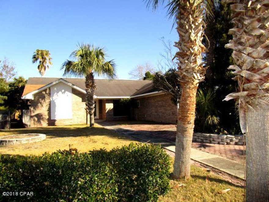 ALL-BRICK HOME IN THE DESIRABLE DERBY WOODS SUBDIVISION!  This home features a Great room with a fireplace, a formal dining area, eat-in kitchen, Master bedroom with french door to the screened porch, and a split-bedroom plan with two good-sized bedrooms. Outside is an in-ground pool, covered pavilion and additional storage building.  This home is being sold in its AS IS condition.