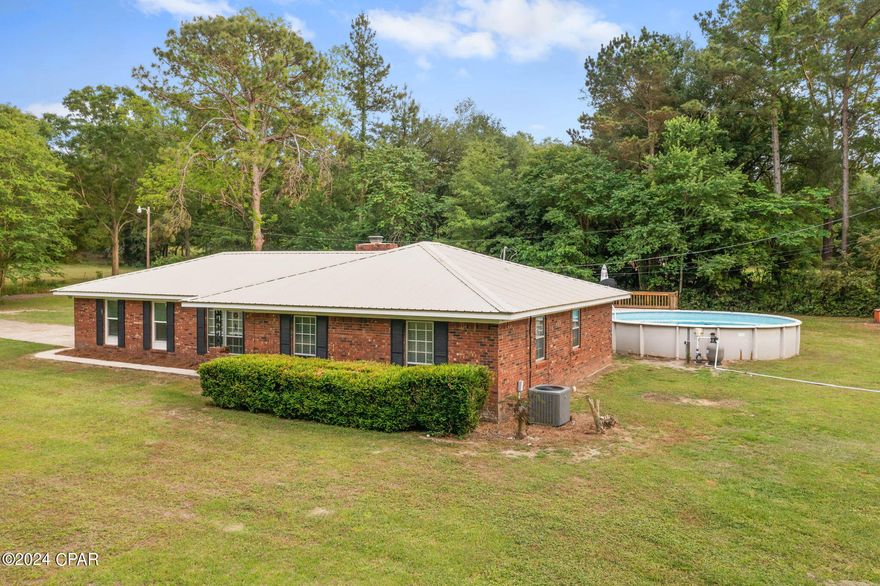 Don't miss out on the chance to see this stunning, modernized 4 bedrooms, 2 bath home on Mockingbird Lane, just minutes away from the beloved Falling Waters State Park. This park boasts a picturesque waterfall, scenic walking trails, and a spacious camping area for outdoor enthusiasts.

Step into the kitchen and discover a plethora of white cabinets, a convenient pantry, a cozy breakfast nook, and sleek stainless-steel appliances including an updated refrigerator and dishwasher. The kitchen also features stylish laminate flooring for easy maintenance.

The living room is adorned with a charming wood-burning fireplace and offers a separate dining area for formal gatherings. A bonus office space is located adjacent to the fourth bedroom, providing a versatile layout for any lifestyle.

The oversized laundry room adds practicality to this home, while the exterior boasts a concrete patio just steps from the back door. Enjoy warm days by the massive above-ground pool and adjoining deck, perfect for hosting gatherings and entertaining guests.

The spacious yard is ideal for pets, gardening, and more along with a pole barn for parking any outdoor equipment, boats etc under. Updates to the septic lines and HVAC unit ensure peace of mind for the future. Come and see all the wonderful features this home has to offer!!!!!!!!!!!!