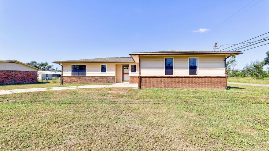 CURRENTLY UNDER CONTRACT, SELLER ACCEPTING BACKUP OFFERS. This gorgeous, remodeled 3 bedroom/2 bath home has only had 1 owner and sits on a LARGE corner lot! This home is conveniently located walking distance to the bay, close to Tyndall AFB, shopping and restaurants. Open floor-plan with kitchen overlooking living room and dining area. Kitchen has been completely remodeled to include removing a wall to open up the floorplan, quartz countertops, custom cabinetry with soft close drawers, recessed lighting, breakfast bar and tiled back-splash. All new flooring throughout, new drywall, completely remodeled bathrooms. Living room has a wood burning fireplace and sliding glass doors to the backyard. 2 outdoor sheds with electricity. New HVAC May 2018, extra insulation.