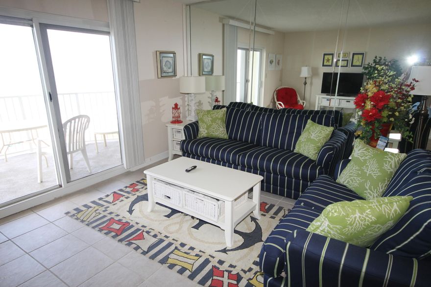 A unique floor plan, this 7th floor Townhouse has two balconies located in the center of the ''C'' building, closet to St. Andrews State Park. Sit back, relax and watch the dolphins playing in the Gulf of Mexico from either balcony located off the living room or from the upper balcony off the master bedroom. The kitchen, 1/2 bath, dining and living area are on the 7th floor. The two bedrooms and two baths are on the 8th floor. A must see. Unit is 1298 sq. ft. including balconies. The quiet end of the beach offers easy access to fine restaurants, boating excursions, etc. Walk, hike, bike, fish, snorkel,or launch your boat at St. Andrews State Park.  All information is believed to be correct but should be verified by the buyer.
