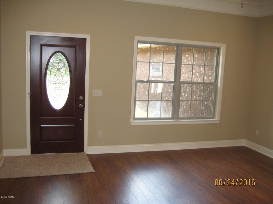 **NEW CONSTRUCTION** Very convenient location of old Cedar Grove community. This 3Bedromm/2Bath features a very open split bedroom floor plan with 10' ceilings in the living room and box ceiling in master bedroom. Kitchen includes custom built Beechwood cabinets with Granite counter tops. Appliance package will include a side by side with ice maker and solid surface range/oven combo. Ceiling fans in all bedrooms,living room and covered rear porch. Finished garage has pull down stair case with attic storage. Energy features include 14 SEER Electric Heat & Air system with R-38 Insulation in attic and R-13 for walls plus extra interior soundproofing. Full landscaping package includes sprinkler system & complete sod package. Seller is one of Bay Counties best w/over 30 years experience!!