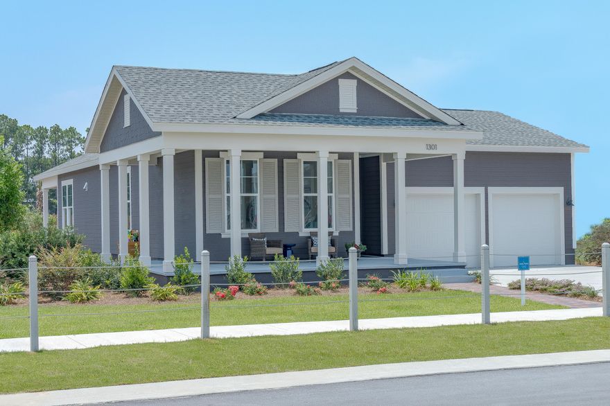 This house is a new construction Model Home Example and not the actual house being built. This home features the Anna Maria floor plan with a Boatbuilder Elevation.Samuel Taylor homes are truly one of the best constructed homes in Bay County. We build our homes with 2x6 exterior studs vs other builders using 2x4's. Not only is it a stronger home, but this also allows us to put R-19 in the walls instead of R-13.  We also use R-38 in our ceilings vs R-30 like most builders. We insulate most of the interior walls to make a very quiet home. SS appliance package is standard along with brushed nickel faucets, security system, 8 ft. doors throughout, granite counters in kitchen and baths, raised vanities with under mounted porcelain sinks, SS gas oven, over sized tiles, upgraded carpet with 8 lb padding and much more.
   A craftsman style trim package adds to the character and uniqueness of our homes. Choose from 3 exterior elevations: Classic, Coastal, or Boat builder. Pick from traditional style garages or our detached garages with optional carriage home above, perfect for the college student, guests or in-law quarters.
   SweetBay offers biking and hiking trails, a boathouse to launch canoes, kayaks and paddle boards, a permitted marina, community pool (construction to start 2016), several parks, ponds, children's playground, planned township with a major grocery store and many shoppes. Everything is within a 5 minute walk or less.  University Academy is the center of this beautiful community. The Academy is the #1 school for math and reading for the Bay County District. Your children are automatically enrolled with purchase of a home. Currently there are over 800 on the waiting list to get in to the school. Come see what everyone is talking about!