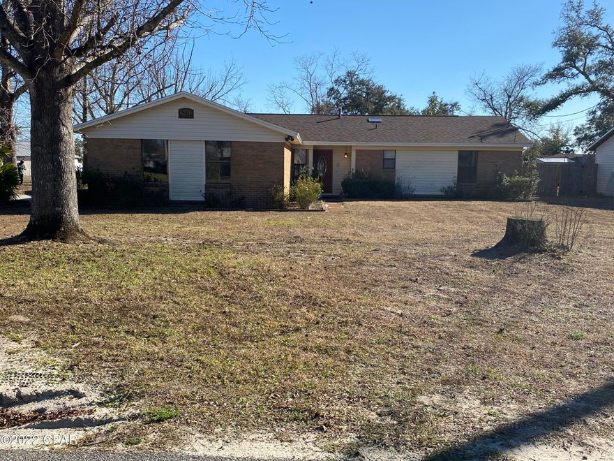 Beautiful brick home in a well- kept Callaway neighborhood. Close to Tyndall Air Force Base and shopping. 16x30 pole barn with slab/power/sewer for an RV with 10 ft. height. Separate workshop/storage building w/electric and well. Built in irrigation system operates from well water. Screened back porch w/a jacuzzi and plenty of room for entertainment. Brick floor to ceiling fireplace w/ option of gas or woodburning. Spacious oversized garage. This home has so many possibilities. Great location for military family. This home won't be here for long! Make your offer! Great canvas to be creative.