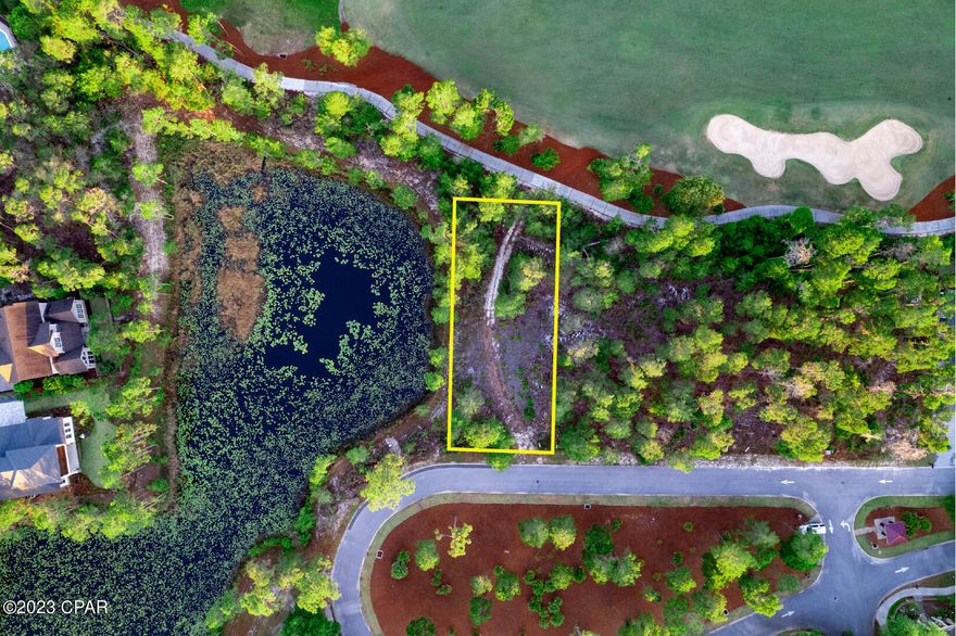 WAKE UP EVERY MORNING ON THE WATER!  This beautiful lot is located in one of the most prestigious and gated neighborhoods on the beach! Positioned perfectly alongside a large pond filled with lilly pads and fish! Don't forget the golf course located directly to the rear of this lot. Nestled in just enough woods to make this a trifecta for living...woods, water, golf! Tucked away on a less-traveled cul-de-sac. Wild Heron has amenities not only for the golfer but tennis buffs too.  Hiking and walking trails, fitness center, heated pool, fire pits and so much more!  Customers must be accompanied by an agent. Go Show this gem!  Gorgeous lot.  Submit all  offers.