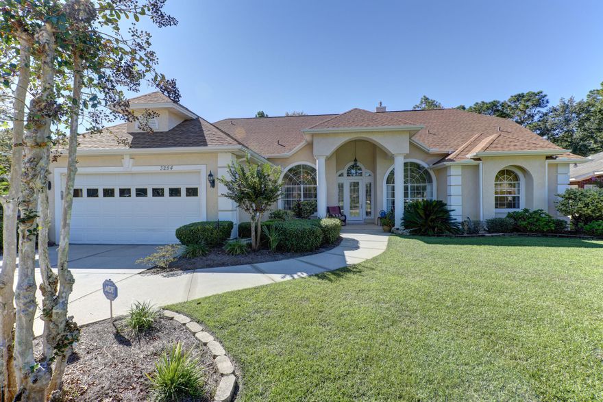 Beautiful large home in the Panama City Country Club! Floors are carpet and tile. Eat-in kitchen opens into a great room with gas fireplace and lots of built-ins. Split master plan has large master w/gas fireplace and built-in bookcases. High ceilings through out with crown molding.This home has many upgrades surround sound, security system, recessed lighting and more! LUXURIOUS MASTER BATH HAS TWO WALK-IN CLOSTS. THIS THREE BEDROOM HAS AN OFFICE. ALL ROOMS FEATURE HIGH CEILINGS, CROWN MOLDING AND PLENTY OF STORAGE. OVERSIZED GARAGE HAS SPACE FOR GOLF CART. All measurements are approximate please verify if important!