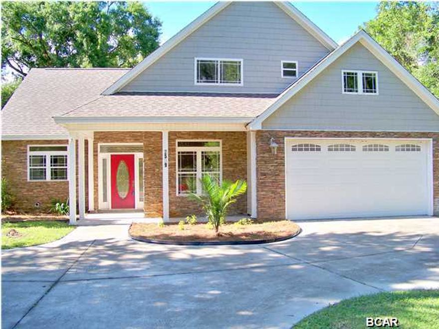 There's no place like home! This stylish residence is nestled on a large level lot in a desirably tranquil location. The home comes with a welcoming open floor plan, kitchen/dining area, separate dining room, two full baths and one half bath, enormous living room complete with cozy fireplace, oversized first floor master bedroom, master bath with gorgeous tile floor and accents throughout and a large walk in closet. The living room is equipped with a charming fireplace and vaulted ceiling. The additional bedroom is located upstairs and there is a bonus room that could easily be made into a third bedroom by adding a closet, there's plenty of room. The exterior of the home is beautiful with attractive stone veneer siding, a huge two car garage and a magnificent screened in-ground pool to enjoy on those hot summer days. Peaceful living while being conveniently close to shops, schools and entertainment. This beautiful home has it all. And with the new carpet, paint, stove and dishwasher it's move in ready. Don't miss this chance to own a charming, custom built home in a trendy area. Request a showing today. All measurements, ages and room sizes are approximate please verify if important. This is a homepath property.