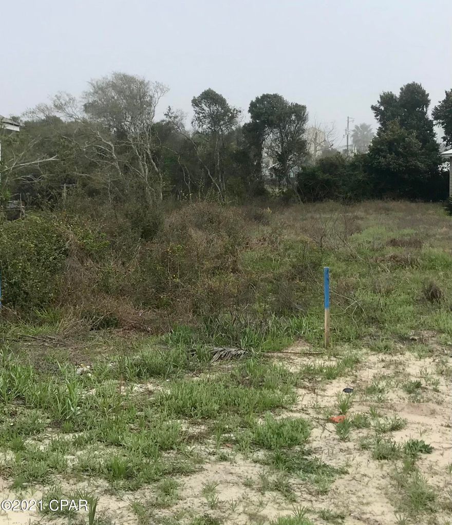 The lot that you have been waiting on is ready for you. Build your dream home up to savor the beautiful evening sunsets over the Gulf. A naturalpath going down to the white sandy beach, that has no obstructions built upon it. Where can you possibly find such a treasure, that is a short distance from your beach home.