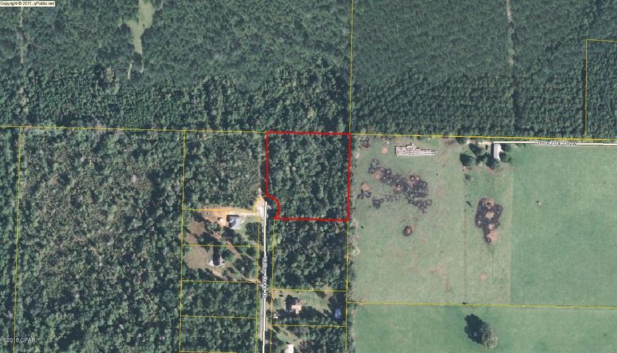 This is a nice 2 acre lot to build your dream home on in the country and still be minutes from town. No mobile homes. See plat map for drainage retention easement on SE corner of lot.