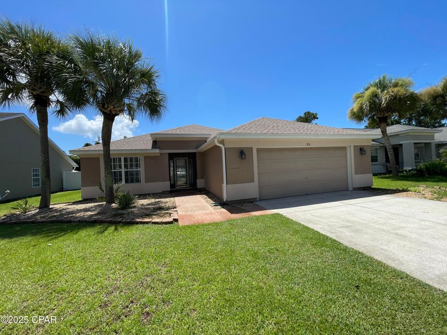 For Lease - 3 BR | 2 BA home in desirable Palmetto Trace, a golf cart community behind Pier Park with sidewalks and 2 community pools! The home features a spacious and open concept living area with wood floors and tall ceilings. The kitchen has a ton of cabinet and counter top space with all appliances including Refrigerator, Dishwasher, Stove/Oven, & Microwave. There's a kitchen island bar overlooking the dining and living room. Bonus room/Formal Dining/Office off the foyer entrance; The master bedroom is on the back side of the home and has a private sliding door entry to the screened porch. Master ensuite bathroom with walk-in shower, soaking tub, double vanities and large walk-in closet. Two additional bedrooms with shared hallway bathroom including a tub/shower combo; Laundry room inside leading to the Two Car Garage! Fenced backyard and stone patio and grilling area for entertaining outdoors! **Pets negotiable with $250 pet deposit, $50 pet fee, $25 monthly pet rent per pet.