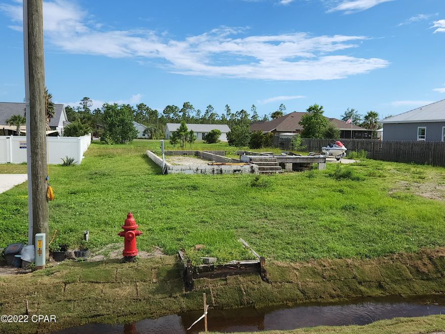 CURRENTLY UNDER CONTRACT, SELLER WILL CONSIDER BACKUP OFFERS PRICE DROP,  EXTREMELY MOTIVATED SELLER. Fantastic lot  just a mile off the beautiful beaches. Very quite area and perfect for your new home. This area is recovering quickly and good property is hard to find. This one will go fast.