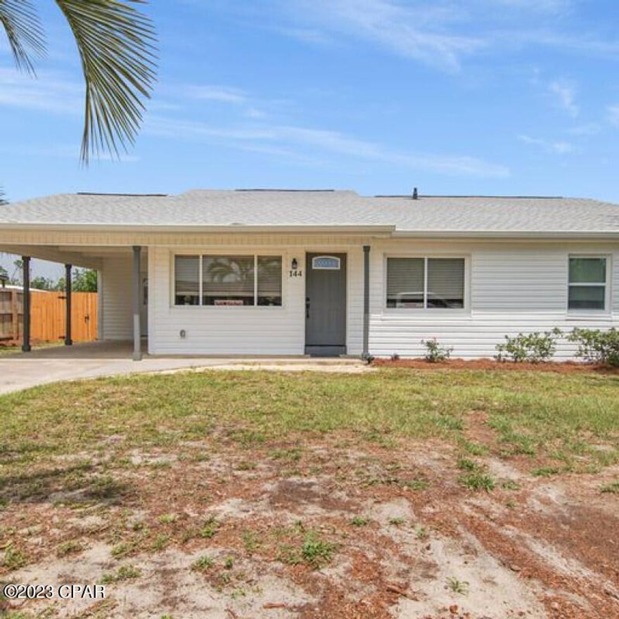 Come see this beautifully update home! Great location on quiet street, but still close to shops, Tyndall Air Force Base, Eastern Ship Building, boat ramps, parks, and many more fun places. New roof in 2019, Brand new HVAC in 2023 with new ducts and insulation. New kitchen features Samsung appliances and Granite tops. Both bathrooms have custom Tile areas and the master bath also features a separate Soaker Tub. Master bedroom has 2 walk in closets. There is a second living room/den area that has plenty of room for entertaining. The huge back porch has aluminum cover to keep it shaded while you relax and enjoy the large fenced back yard. Plenty of room to add a pool. Extra slab outside for RV or Boat storage too! Home has recent insurance and wind inspection forms on site for your review. Come look at this renovated, turn key, beautiful home today!