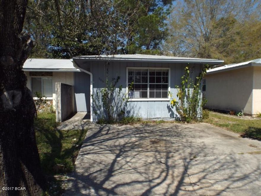 Two bedroom One bathroom end triplex unit in Lynn Haven offered as is.  All sizes are approximate or taken from other sources please verify accordingly.