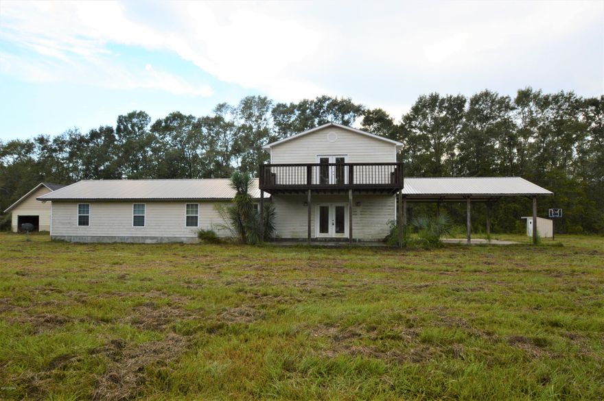 Country living!!!!! If you are looking for privacy look no further. Two story home on 20 acres. Perfect place to hunt and fish. Large barn for plenty of storage as you drive down long drive to custom home. Large dining/kitchen area off of Great room. Downstairs 2 bed room with Jack Jill bath. 1/2 bath for quests master bedroom upstairs with full bath. Home has buried propane tank and generator. SOLD AS IS!!!