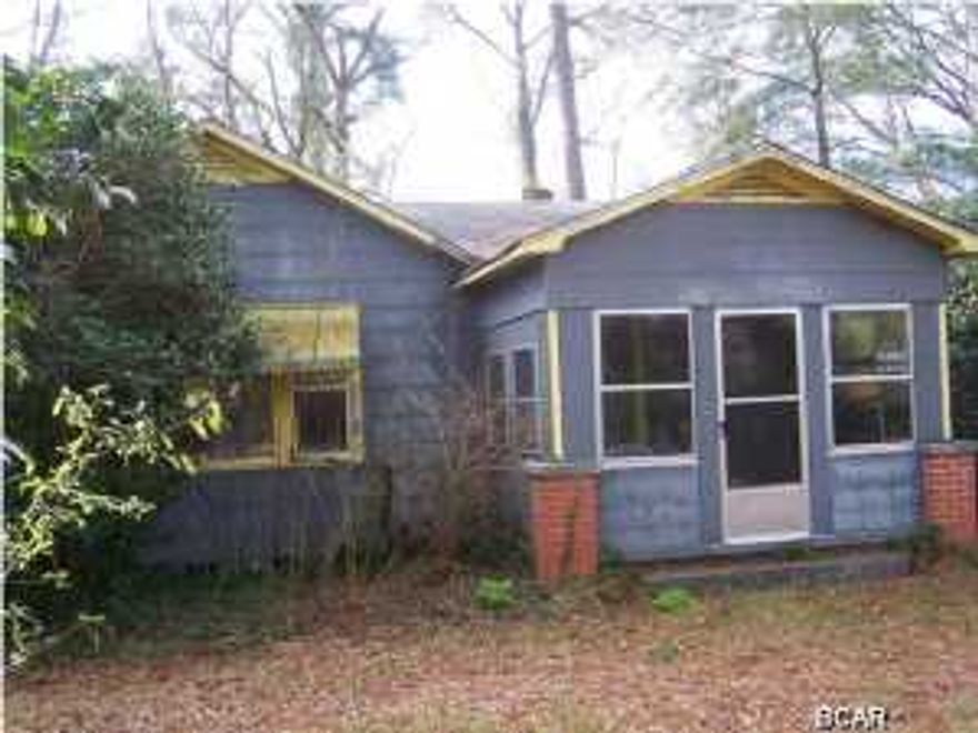 This 18.4ac Hobby Farm is located only 50 miles from the Sugar White Sands of Panama City Beach. The charming Farm Home needs just a little ''TLC'' but offers a Fireplace, Wood Burning Stove, original Hardwood Floors and is nestled in the shade of several mighty Oak Trees. As just one of its many upgrades, this home has 100% Generator Back-up Power via propane gas. If you need a Barn or Workshop on your Farm this property has 2 as well as a Chicken Coupe. All the out structures have masonry walls and concrete floors. The 18.4ac is complemented by the Bay tree hammock that promotes the abundance of wild life. Crops, Livestock, hunting or just plain relaxing this home has it all!