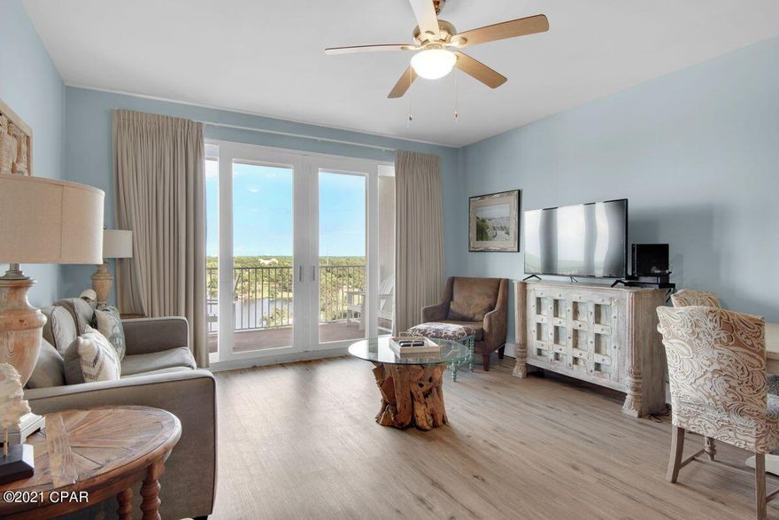 Flawlessly decorated with coastal decor, this two bedroom condo at Laketown Wharf is being offered fully furnished and turnkey ready. Located across the street from the emerald green waters of the Gulf of Mexico, unit 1028 features two full bedrooms, two full bathrooms, a bunk room and serene views from its 10th floor balcony. Notable features include a large lakefront master bedroom, stainless steel appliances, an open concept floor plan and granite countertops. This would be a phenomenal investment opportunity with gross annual rental income projected at $32,000. Laketown Wharf is full of endless amenities including five pools, a state-of-the-art fitness center, covered parking, mini golf, on-site dining and shopping, 52,000 square feet of lakefront boardwalk and meeting spaces for large group functions. Dimensions and information is deemed to be correct, but should be verified by the buyer.