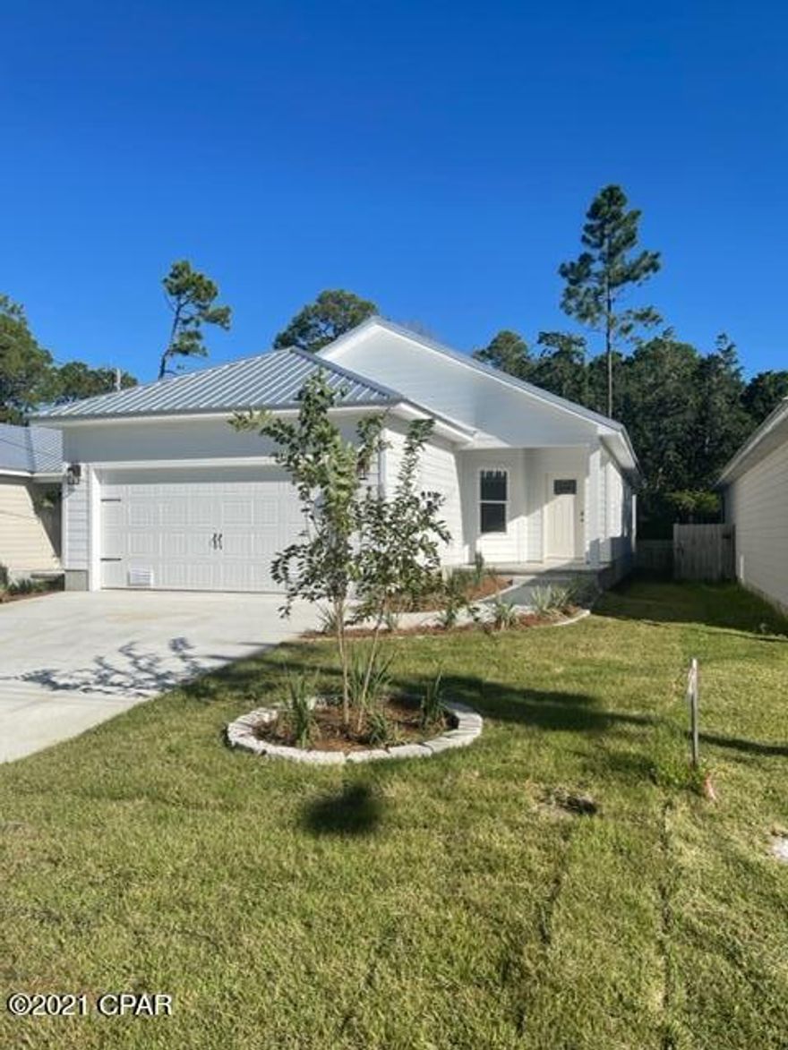 NEW CRAFTSMAN STYLE HOME in a GOLF CART friendly neighborhood, offering a quick trip to PIER PARK and the WHITE SAND BEACHES! This charming home features OPEN LIVING SPACES that make the most of the square footage. An upscale kitchen features QUARTZ counter tops, WHITE CUSTOM CABINETRY and top of the line GRAPHITE STAINLESS APPLIANCES. The master bedroom is extra spacious and includes a walk in closet and nice master bath. On the outside you'll appreciate the HARDIE BOARD CONSTRUCTION, METAL ROOF, HUGE COVERED PORCH and 2 car garage. Best of all, you're just steps from FRANK BROWN PARK to enjoy the POOLS, DOG PARK, WALKING TRAILS and incredible entertainment opportunities. All that plus      '' NO HOA's'' !