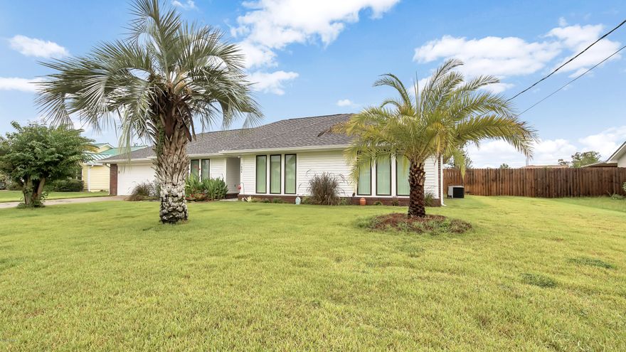 Fantastic 3Br/2Ba Lynn Haven home! New vinyl plank flooring & fresh paint through out the home. New quartz counters, new soft-close kitchen cabinets, & bathroom vanities.  New vinyl windows. The home features a vaulted ceiling in the living room with a real wood fireplace. The garage has a large work area. The laundry room is over-sized! Tiled tub & shower enclosures. The septic system was replaced 2019, along with the sod & sprinkler system. New roof & HVAC 2019. Located in a sought after neighborhood and only minutes from the beaches, shopping, & dining. Make your appointment today!