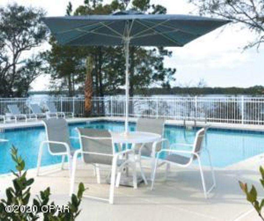 !!BEST VIEWS OF THE LAKE!!!Available NOW! COMPLETED Construction. AFFORDABLE WATERFRONT LIVING ON LARGE COASTAL DUNE LAKE AND ONLY MINUTES TO THE BEACH!! New Lakefront Community. Townhome has a BEAUTIFUL VIEW OF THE LAKE from the Kitchen, Family Room & Balcony. Perfect for Easy Access to Hwy 98, Airport, and minutes from the Beach and 30A. This spacious Townhome residence offers a one-car GARAGE, large pantry & lots of storage!! NEW 2018 AC, Hotwater Heater, and new stainless steel appliances including refrigerator, Quartz countertops, walk-in laundry room, all wood cabinetry with soft close (upgrade), WOOD FLOORING THROUGHOUT, ceiling fans, window treatments, Large Balcony with Lake View, Community Dock for Fishing, FENCING BACKYARD for PETS/PRIVACY, High Impact Doors and windows. Boating is allowed on Lake Powell and a public boat ramp is at the end of the street. THIS NEWLY COMPLETED TOWNHOME UNIT IS AVAILABLE NOW, INCLUDES UPGRADES, AND CURRENTLY PRICED $10,000* LESS THAN BUILDING 2 (*unit, 22924 Ann Miller). Only 25 total townhomes and 4 Buildings in this new lakefront development. Community has a 30 day minimum rental restriction. Furniture not included in price, however, it is negotiable-to provide a fully furnished townhome.