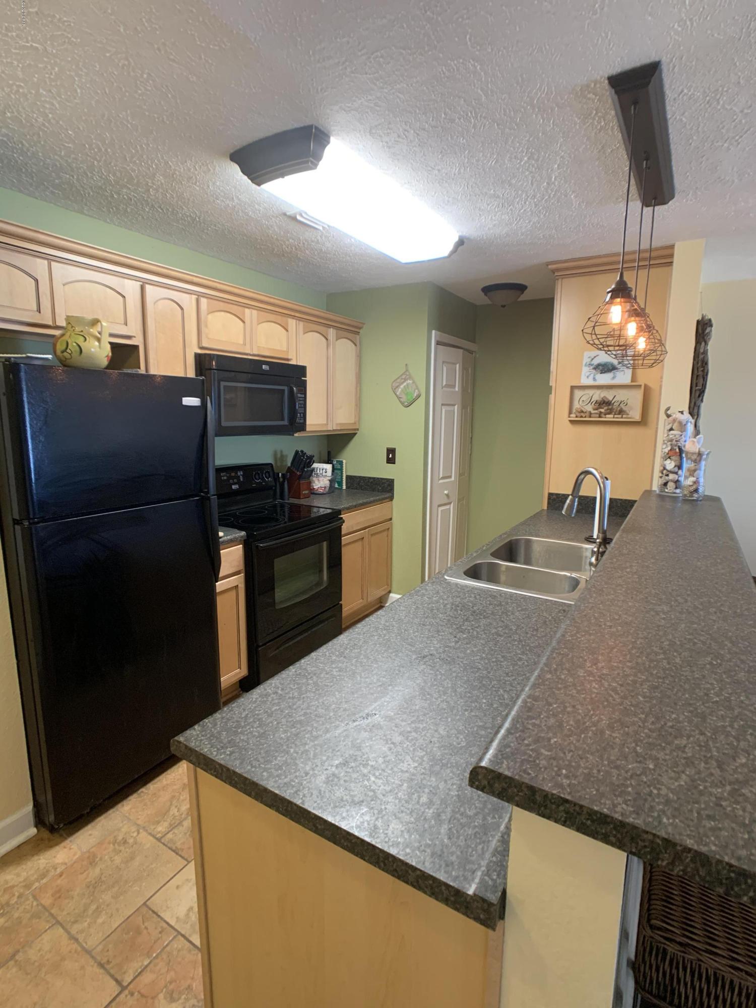 Grand Lagoon Cove Condominium - Residential