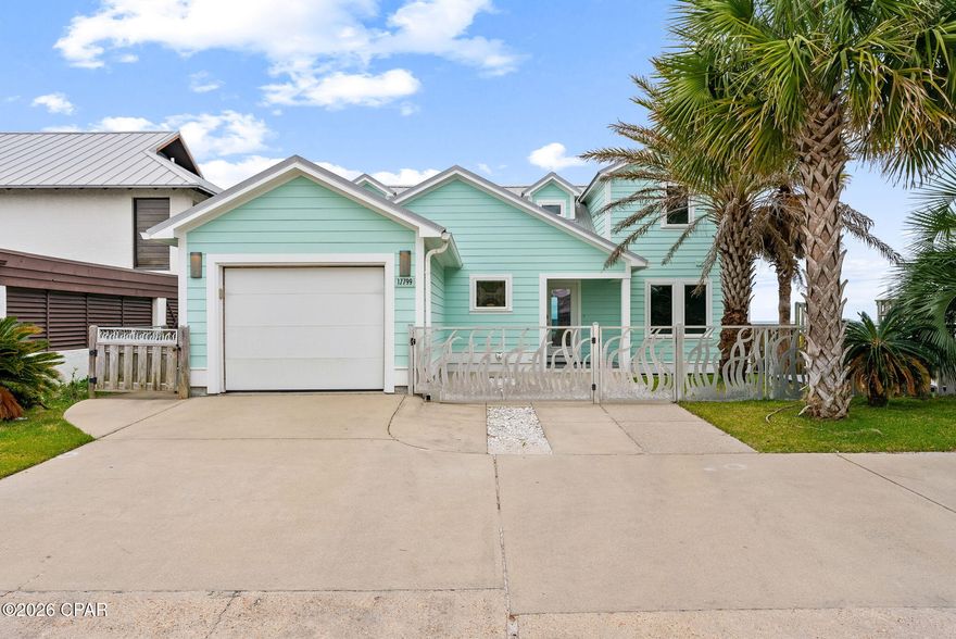 Gulf Front Very Desirable West End Unit.  Undated unit with new appliances and countertops, Garage has been converted to a game room and is air conditioned. many upgrades including hurricane rated windows and doors, security system, A.C.'s with dehumidifier and custom fencing around the front yard.