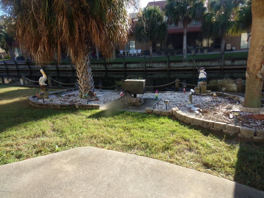 RARE 3 BEDROOM WATER FRONTAGE AT GULF HIGHLANDS. Less than 1500 ft from a public beach access, is move-in ready, and by far has the best backyard of any unit for sale in the community.Gulf Highlands has 11 heated pools, tennis courts, shuffle board, and putt-putt golf! Making sure you enjoy every moment of your day and your guests do too.