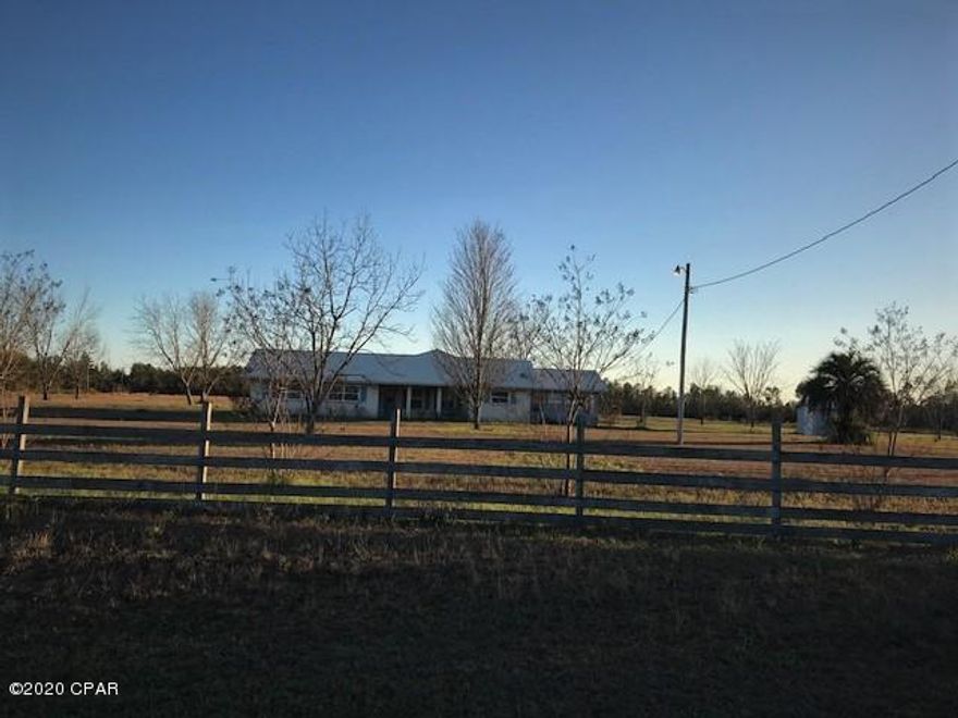 'CURRENTLY UNDER CONTRACT, SELLER ACCEPTING BACKUP OFFERS' Wonderful setting for this lovely, remodeled 3Bedroom 2Bath home on approximately 45acres.  The home is concrete block with stucco and hardie board exterior, new metal roof, new soffits, new hot water heater, new interior & exterior paint, master bath enlarged, HVAC 2 years old, new windows & new LED lighting throughout the house.  The home also has a whole house generator w/full auto start, 18kw service w/350 gallon capacity.  The property has two  deep wells 200+ ft., 30'x40' shop w/heat & cool & half bath, shooting range w/12'x24' heat & cooled building and two other large metal buildings.  Multiple Parcels - 31-2N-11-0000-0018-0000, 31-2N-11-0000-0019-0000, 31-2N-11-0000-0020, 31-2N-11-0000-0021-000, lots of possibilities!