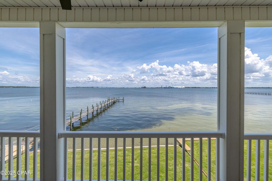 Highly Desirable Rare Opportunity to own this Stunning Waterfront End Unit. 46 Feet on St. Andrews Bay! This home is the Second largest property in the community. The modern kitchen has all upgraded stainless steel appliances well designed soft close cabinets and 2 pantry cabinets which allow for plenty of storage. The Living area includes a wall mounted electric fireplace for Warmth and Beauty. Newly installed 72'' modern ceiling fan. Modern light fixtures. Sprayed insulation in roof provides lower power cost.  Gorgeous views of the Bay from the living area and kitchen. Crown molding and plantation shutters add character and charm.  This spacious home includes 3 Ensuites. The Master bedroom includes a large walk in closet, Master Bath with Soaking Tub, private tiled shower and separate Toilet Room. Double vanity. Private Balcony showcasing gorgeous views of St. Andrews Bay. Second bedroom is spacious and cozy with an attached bath. Jacuzzi tub with double vanity and shower. Private Balcony. Third bedroom has a spacious cozy room with double closet, private bath with tub and shower. Private balcony. The spacious 2 car garage can be conveniently accessed from the 1st floor Foyer. New Sod has been planted along with new pavers for the walkway, steps and drive.  This Prestigious Community includes a Beautiful pool, Hot tub and clubhouse overlooking the bay. The Nature Walk is located on a 7 acre preserve. There are also several docks in the community for boating, fishing and kayaking right from your backyard. Don't miss this opportunity to see this beautiful piece of paradise...~MOTIVATED SELLER!