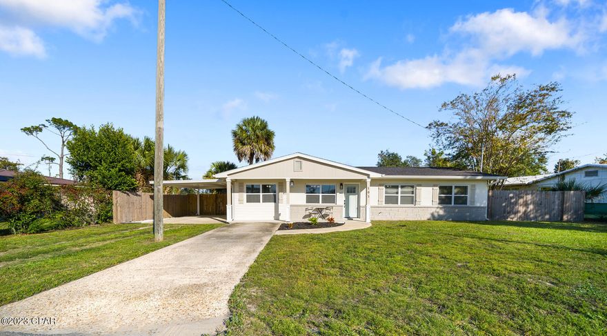 *Under Contract - Accepting Back-up offers* No HOA, STR eligible and just minutes away from Tyndall AFB! You don't want to miss the opportunity to own this completely updated home in Callaway. The open living/dining floor plan welcomes you inside with top of the line finishes throughout including electric fireplace. The Kitchen has quartz counter tops, subway tile back splash, dark wood cabinets, stainless appliances, and soft close drawers. The large primary bedroom with en suite is split form the 3 other bedrooms, and has a large walk-in closet and French doors leading outside to the back patio. Both bathrooms have tiled showers with ample room and there is plenty of storage throughout the home. With almost a 1/3 of an acre there is plenty of room to entertain guests in the fenced in back yard, wood deck and grilling area. The rear of the property also backs up to Veterans Park which has walking paths and playground areas. Conveniently located to shopping, restaurants, and the beautiful waters of Bay County. All measurements are approximate from the property appraisers site. Buyer to verify.