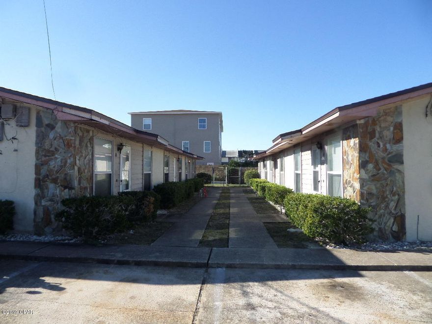 Now available is a 2 bedroom, 1 bath apartment located off Thomas Drive. Walking distance to the beach. Tile flooring, equipped with range, dishwasher, refrigerator, and washer & dryer connections.  Water, sewage, garbage included.