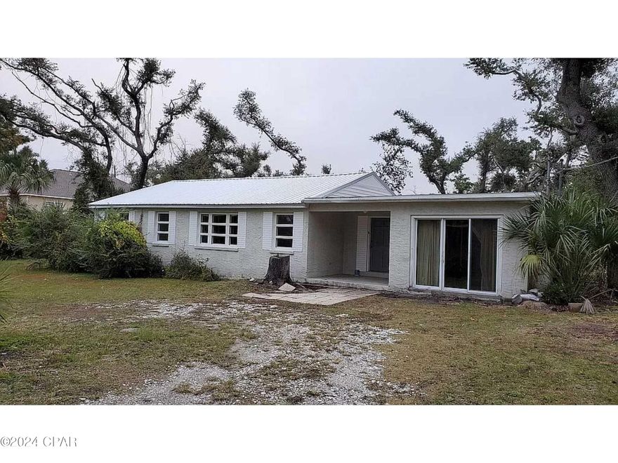 a place that's seen some things. She been rode hard and put away wet by the last tenant. it's a got a great metal roof, but this pig is gonna need some new lipstick. Double lot (could be split) or fix it up knowing you don't have to deal with the poorly done surface only renovations of some hack.