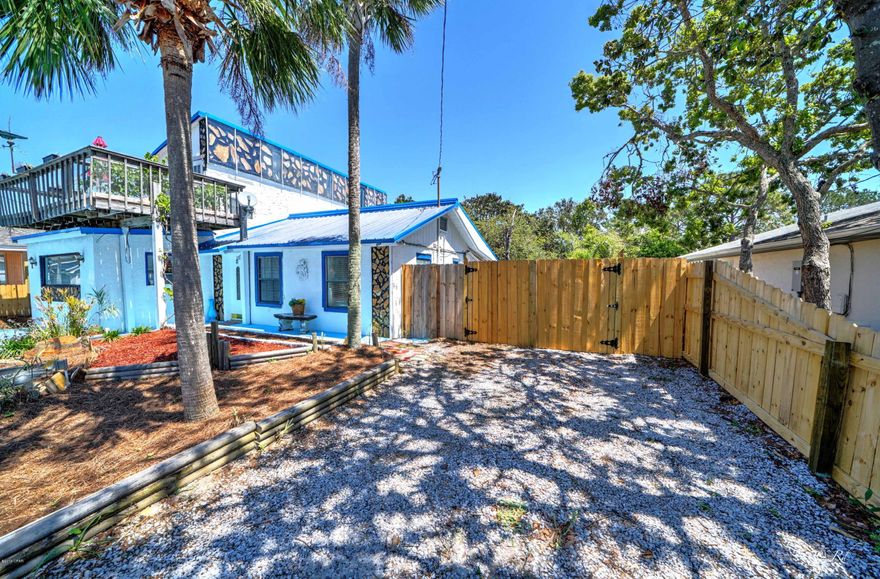 Quaint Old Florida beach house walking distance to the beach! What a location! This  Bahama Beach neighborhood is about two miles from Pier Park. The yard is a good size and comes equipped with 2 large yard buildings, an above ground (partially in ground) pool, and a  great deck--all synergizing to create that perfect tropical escape. The home has areas of flex space that present opportunities for additional rooms for home schoolers, for art or music or extra sleeping areas for guests. The kitchen is spacious with decorative backsplash, gas range for all you  chefs, neutral large tile for easy maintenance. The dryer hookup could go electric or natural gas. One of the bonus rooms is currently being used as a 4th bedroom. The home offers lots of storage and the utility room is huge. The double gate allows not only enough room to park an RV in the driveway but also a boat in the secure backyard behind the double gates. All this a short walk to the sandy shores of one of the world's most beautiful beaches!