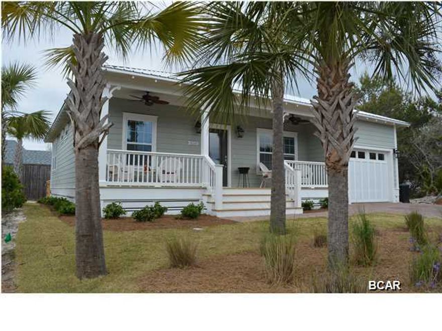 Great Price on a West End PCB beach cottage...Paradise Grove is a gated subdivision with LUSH landscaping, street lights and a resort style pool. This energy efficient home will include Granite, stainless, coastal trim package, upgraded lighting package, bullnose archways, jetted tub, tiled shower and more! Call today to pick your paint colors!