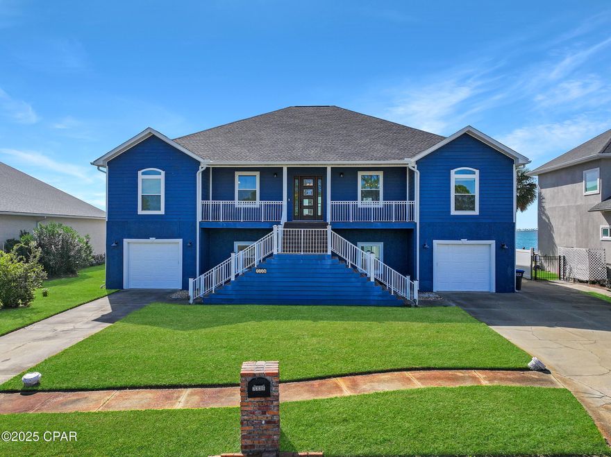 Dreaming of a stunning waterfront lifestyle? This one has it all. Don't miss your chance to own this beautifully updated bay front home offering unobstructed water views and breathtaking sunsets from nearly every room. With 3048 sq ft of well-designed living space, this spacious 4-bedroom, 3.5-bathroom home (including two ensuite bedrooms) combines comfort, style, and convenience—all in an unbeatable location. Step outside and enjoy direct water access with your own private dock and boat lift (fits up to a 30 ft vessel), perfect for quick trips to the Gulf or Shell Island. Need more space? There's room beside the home to store your RV or additional boat with ease. Inside, the home has been thoughtfully updated with brand new impact-rated windows and doors, offering both peace of mind and added insurance savings. The roof and HVAC were also replaced in 2019, making this home move-in ready and worry-free. Designed for both entertaining and everyday living, this home features an elevator for easy access to both floors, a huge 10' x 68' screened porch overlooking the bay, and a bonus lower-level indoor space (not included in sq ft), currently used as a movie and game room. Garage access is available from both sides of the home for added convenience. Located just minutes from restaurants, shopping, and Tyndall Air Force Base, this home offers the perfect blend of privacy, luxury, and accessibility. Homes like this don't come around often—especially at this price point. Schedule your private tour today and discover the rare opportunity to live your waterfront dream!