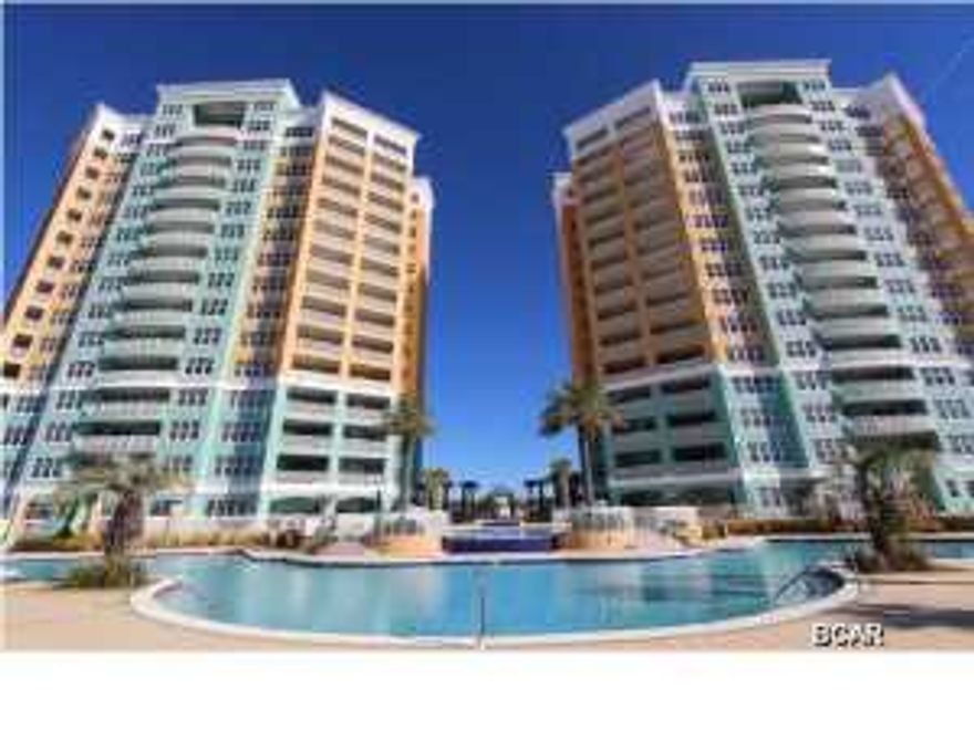 En Soleil is one of the most sought after Resorts in Panama City Beach. When you arrive for the first time, you will understand why. With only 3 units per floor, En Soleil is an upscale, low density, platinum rated condominium complex, designed to create a luxurious retreat for the most discriminating. Featuring grounds offering more than 6,500 square feet of exclusively designed pools, hot tubs, cascading water falls and circular fountains graced with lush Mediterranean vegetation throughout and 24 hour gated security. As you pass through the double entry doors, you will find yourself surrounded by luxurious tropical decor, displaying lamps, oriental rugs and comfortable seating, all beckoning for you to kick back and enjoy the commodious, open living area which is centered around