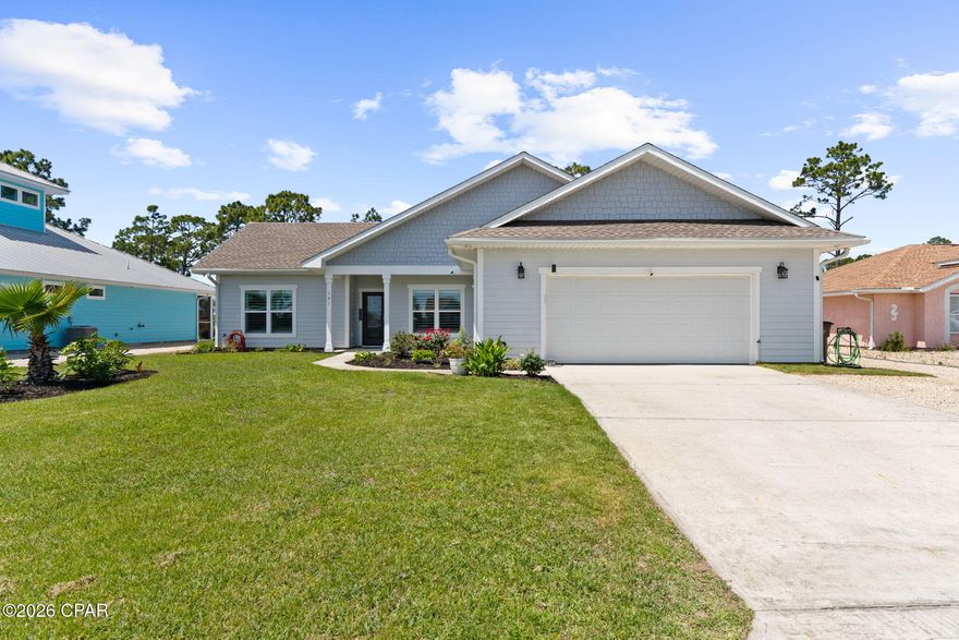 COASTAL LIVNG ELEVATED!! 303 Nautilus is a beautifully crafted coastal retreat tucked in the SeaShores community in St Joe Beach. This thoughtfully designed one-level home with 3 bedrooms/2.5 baths & an office/flex space that can serve as a 4th bedroom. From the moment you arrive, the coastal vibe with new plantation shutters sets the tone for what's inside. Inside, a bright, open-concept layout where natural light pours into the living, dining & kitchen areas, creating a warm, inviting atmosphere perfect for gathering with family & friends. The kitchen features a large island with breakfast bar seating, modern appliances, pantry storage & plenty of prep space- ideal for hosting gatherings or casual beachside meals. The split floor plan offers privacy, with a spacious primary suite designed for unwinding, while guest bedrooms provide ample room for visitors or rental guests. The garage has been converted into a climate-controlled workshop, ideal for hobbies or future customization. Step out back to a landscaped porch area perfect for morning coffee or evening gatherings, all while enjoying coastal breezes. This oversized lot provides plenty of room to add a pool, create an outdoor entertaining area or simply enjoy the extra space & privacy that's hard to find this close to the Gulf. The property also offers ample space for boat or RV parking along the side of the home, complete with a 50 amp electric service for easy hookup--perfect for coastal living & weekend adventures. With the beach just moments away, you're never far from the sugar-white sands & emerald waters of the Gulf. Embrace the lifestyle that makes this area so special--spend your days fishing, boating, paddleboarding or simply relaxing by the water. Hop on your golf cart & explore everything Mexico Beach & Port St Joe have to offer, from boutique shopping & local restaurants to live music, marina access & year-round community events. Whether you're searching for a full-time residence, a 2nd home or an income-producing investment, this property delivers the perfect combination of space, style & location along the Forgotten Coast. Call for your private tour & LIVE THE BEACH LIFE!!