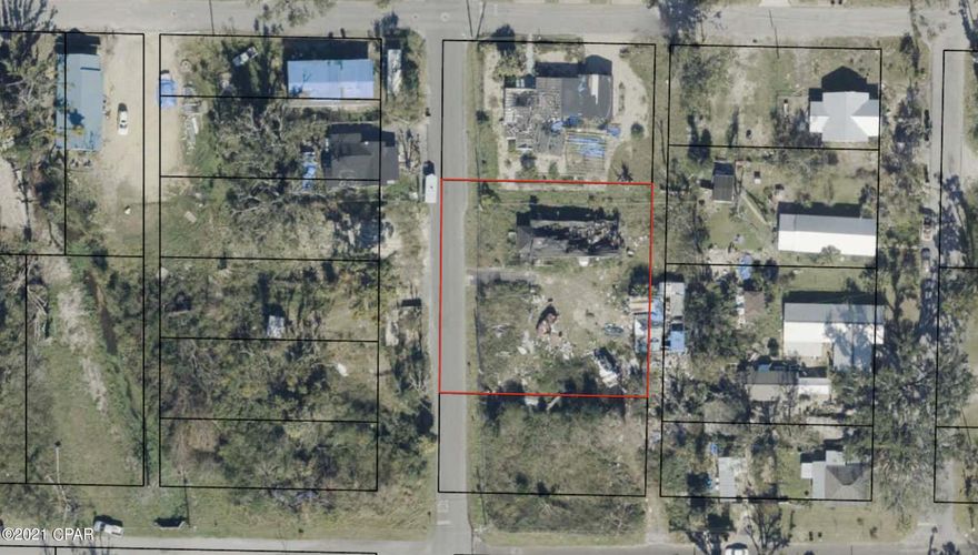 Double lot in Springfield.  Original home damaged in fire following Hurricane Michael.  BUYER TO VERIFY ALL INFORMATION DEEMED IMPORTANT