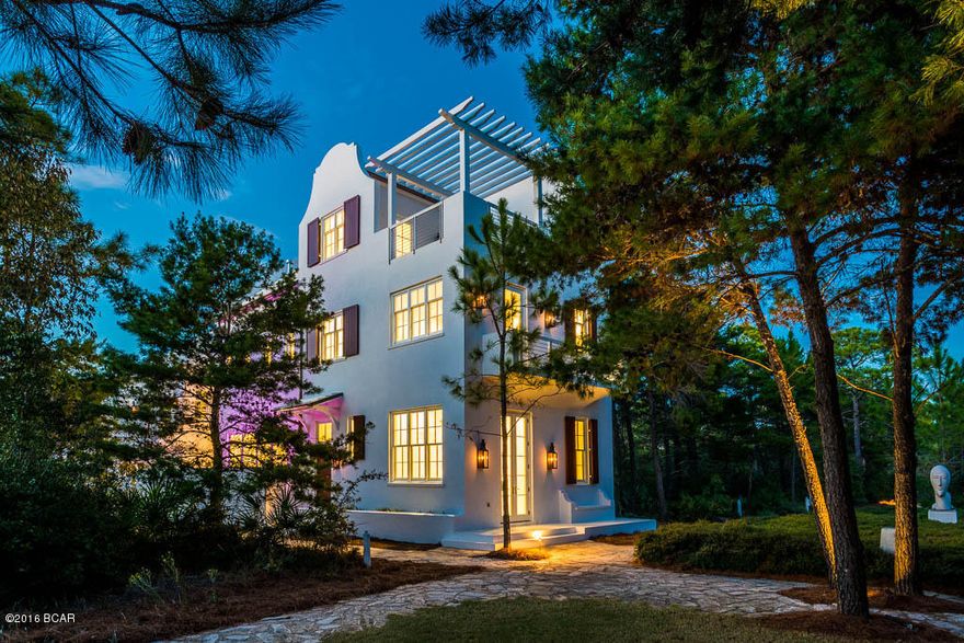 Known as one of the most beautiful locations in the world, this highly accredited A Boheme Design home is beautifully located in Alys Beach. Situated on Arboleda Park, the home is within steps to Caliza Pool with poolside dining and more. This spectacular 3 bedroom /3.5 bath home features modern clean lines that compliment the main home as well as the separate carriage house with 1 bedroom, 1 bath, full kitchen, laundry and 2 car garage. The main home features two eloquent master suites fully equipped with multi-spray showers and a large walk-in closet.The spectacular kitchen is fully appointed with gloss white cabinets, artistic modern hardware, stainless steel appliances and two dishwashers. A separate bar features a built-in filtered water station with two additional refrigerator drawers. All of the counter sufaces in the home feature white quartz giving a subtle modern flare. Natural stone embraces the first level interior as well as all the bath surfaces. Separate full sized laundry room on the second floor is one of 3 on property. The third floor features a large bonus/media room with additional finished attic space all with walnut flooring. Relaxing third floor terrace overlooks the park with amazing views of the gulf. Natural light flows throughout every room with 12 ft. ceilings on first level as well as incredible wiring for advanced surround sound with ceiling speakers throughout. The heated pool is complimented with artistic tile and a cascading waterfall viewed from the main living areas. Open views are welcomed with 10 ft. windows and 14 ft. folding Kolbe doors that open to the courtyard for outdoor entertaining. The courtyard is embraced with detailed stone work, equipped with outdoor sound system and subwoofers for the ambiance of your choosing. This home is a must see to fully appreciate. 
Additional features list:Main house and carriage house combined:
Approx 3300 sq ft contemporary/modern
4 bedroom
4.5 bath
Additional Media/bonus room/kids room
Third floor terrace with gulf view
First floor all shell stone
12 foot ceilings on first floor
10 foot ceilings on second floor 
Second and third floor walnut flooring
Floor to ceiling shell stone in showers 
Two masters on second floor with fully equipped shower equipment
His and her vanities in both master bedrooms
Balconies off both masters
Gas fireplace in one master 
Full sized tub 
Walk in closet in master
Walk in laundry room on second floor
Laundry on first floor
Sound system throughout entire house and outside courtyard
Pool with 15' long waterfall feature, tiled wall
Walk in attic space 
Ten foot tall folding door out to courtyard
Plenty of natural light in all rooms
Jenn Air Stainless steel appliances 
Two (2) dishwashers 
Extra wet bar with double drawer fridge in main area
Water filter system with wet bar
White flat panel cabinet doors throughout
White Quartz countertops 3 and 6cm throughout
Office nook with build in cabinets
Bunk area 
Outside shower with dog washing area
House opens up to the park with a built in sitting bench

Carriage house:
Approx 475 sq ft
12 foot ceilings
One bedroom 
Living room 
Full kitchen
Stainless steel appliances - Kitchen Aid
Gas range
Floor to ceiling shell stone in shower
Entire flooring shell stone tile
Laundry hook up
Full sized closet
Oversized two car garage
Attic space