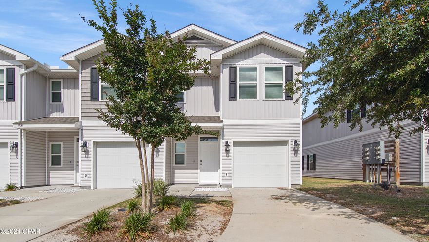 So many features in this townhome include a garage, vinyl flooring throughout the common areas, carpeting on stairs, upstairs hallway and bedrooms. Durable laminate countertops in kitchen and baths. The kitchen is open to the living and dining area and has a breakfast bar. Frigidaire Appliances include a stove, microwave and dishwasher. Additional interior features include recessed panel cabinetry, Moen faucets, LED lighting package and more.  The Community pool is located conveniently across the street from this unit. This unit is an end unit with a fenced in back patio area for privacy.
This unit has a Smart Home package includes a KwikSet keyless entry, Skybell doorbell, automated front porch lighting, and Quolsys touch panel which can be integrated to control your lighting, thermostat, front door.