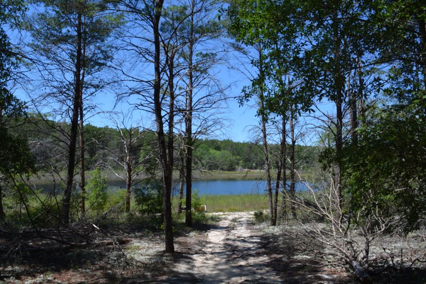 Beautiful piece of property on a peaceful pond, right across from Piney Lake in Chipley. This property is approximately 5.4 acres. A perfect place to build your dream home.