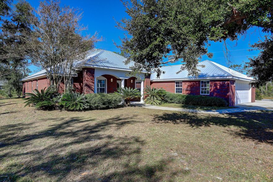 CURRENTLY UNDER CONTRACT, SELLER ACCEPTING BACK UP OFFERS. SPACIOUS HOME IN THE COUNTRY, ONLY MINUTES TO TOWN! This newly refreshed brick home has 4 bedrms, plus a dining room or study. Lovely front porch has room for your rocking chairs! The kit has tons of granite counter space, great for food prep and custom cabinets for dish and food storage, plus a pantry! The refrig, dishwasher, stove and oven are all new. The large laundry room leads to the oversized garage which is bright with natural light!  A split bedroom plan has 2 bedrooms on one side of home and the master on the other along with a smaller bedroom, perfect for a nursery or office. The living room has an elec FP to add ambiance and french doors leading to the wonderful covered back porch that overlooks the big backyard. There is a bonus room off of the MBA that has a hot tub, with adoor leading to the back porch. An attached workshop has a golf cart size garage door, which would also make a great parking spot for your riding lawnmower.  There is limited water access to the Bayou, if you like to kayak or paddle board.  Age, sq ft, room sizes, are estimates only. Please measure, if you are concerned.