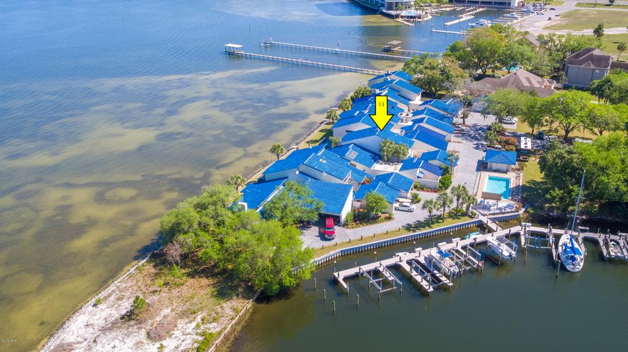 Currently Under Contract, seller accepting backup offers. Gorgeous WATERFRONT, NEW tile roof, New lighting Wine cellar, major updates. On Bay and Canal Boat slip with remote control lift, 3 air

conditioners oversized two car garage, brick paver patio and courtyard, custom gate, remote control exterior solar shades This unit has floor to ceiling glass walls

to enhance your view of the bay. Youll enjoy the view of water from every room except the downstairs guest bedroom, which has a view of the courtyard. The

master suite has his and hers walk in closets and offers a sitting area off the master bathroom where you will enjoy sitting and watching the dolphin play. The master bathroom is done in beautiful travertine, with a separate toilet room and a double headed shower.