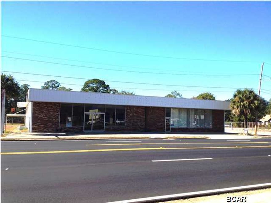 MOTIVATED SELLER! Endless possibilities abound for this building which used to be Gibbs Marine...300 FRONT FEET ON OHIO AVENUE and the CORNER OF 5TH STREET in the heart of Lynn Haven offer high visibility! Over 7,130 square feet including several offices and a warehouse plus upstairs storage. Also included is 300 FRONT FEET on FLORIDA AVENUE which is vacant and zoned mixed use. The entire property is also chain-link fenced. Lots 1-13 (Ohio Ave)Lots 20-32 (Florida Ave) Age, SF and sizes are approximate. Please verify if important.