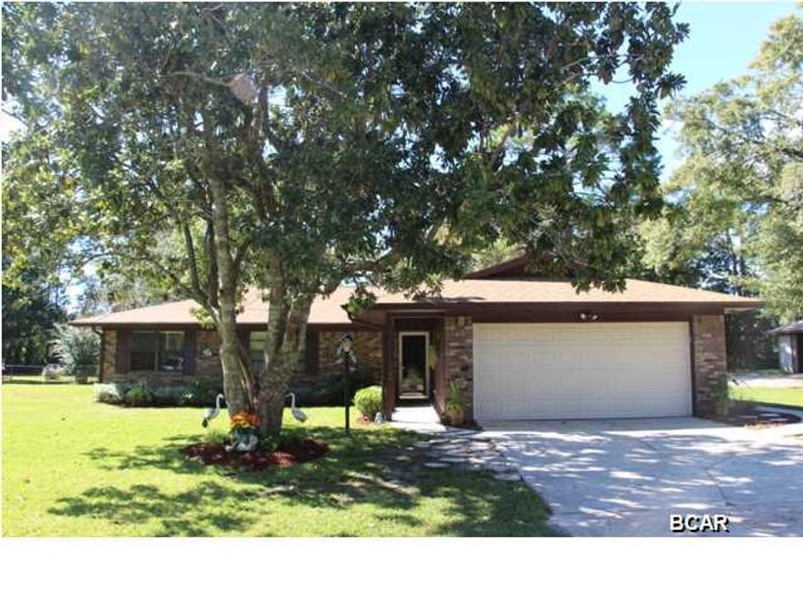 Here is your chance to own a home in College Point, the heart of Lynn Haven. This 3 bedroom, 2 bath, all brick home is in pristine condition! The living room boasts tiled flooring, a wood burning fireplace, and French doors from the dining area out to your private sunroom. The kitchen has plenty of cabinets, a BIG pantry, and black appliances. This home is situated on .49 acres on a quiet cul-de-sac. The entire home has been upgraded with tile flooring. Other upgrades in 2013 - new roof, drain field, fence, gutters, and exterior paint. Tons of built ins in the garage, storage shed in the back, and 2 separate fenced off areas to the yard. Spacious bedrooms, plenty of storage, a HUGE yard, and lots more!!! You will not want to miss this one, have your favorite Realtor schedule