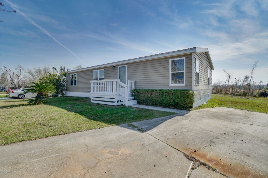 Come and check out this wonderfully maintained home in Sweet water Village South. Recently updated 3 Bedroom 2 bath home boasts of a new insulated windows, roof, vinyl plank flooring, paint, trim, light fixtures, and countertops. The kitchen features solid oak cabinets and appliances are 1 year old. Master Bedroom has walk in closet, double sinks, garden tub and seperate shower. Nice yard with front and rear porches in a quiet cul-de-sac. Property was previously rented for $1200/mon before upgrades were made. Call today to schedule a tour!