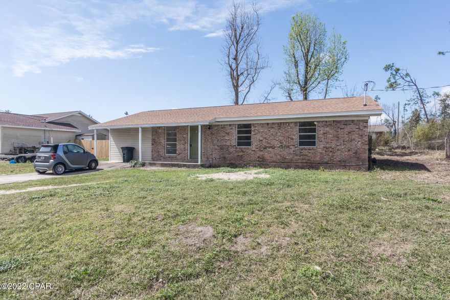 Very open spacious brick home, 3 bed 2 bath, large great room , large eatin kitchen with breakfast bar and dining area which leads out to the back yard and covered back porch, there is a large storage building in the back yard for extra storage space. Just off the dining area is an 8x10 laundry room. Interior has been freshly painted and new vinyl plank flooring throughout except for the Kitchen/dining and baths are tiled. Newer roof and AC was installed 2019. Call today for an appt.